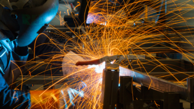 Person welding and sparks flying