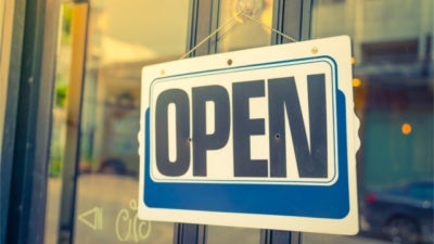 Open sign on a glass door
