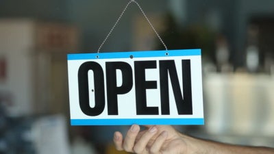 Photo of an "Open" sign