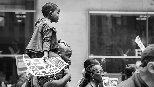 Young Black child in climate march