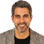 Headshot of with goatee and salt and pepper hair 