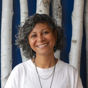 Amira Dhalla's headshot.