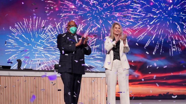 Photo of AFL-CIO President Liz Shuler and Secretary-Treasurer Fred Redmond with fireworks in the background