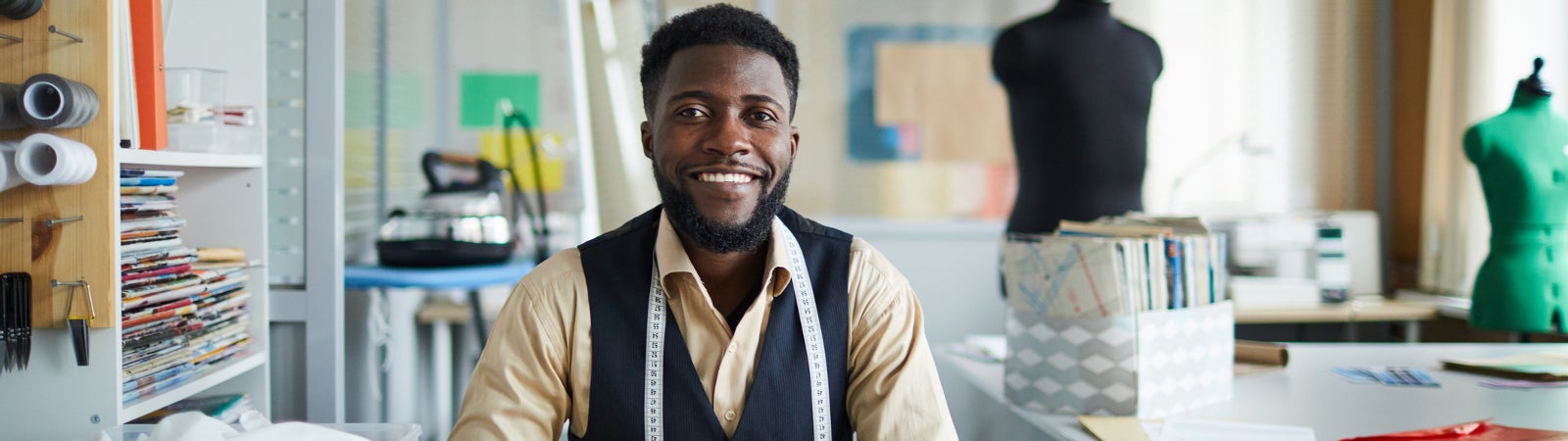 Tailor working in his shop