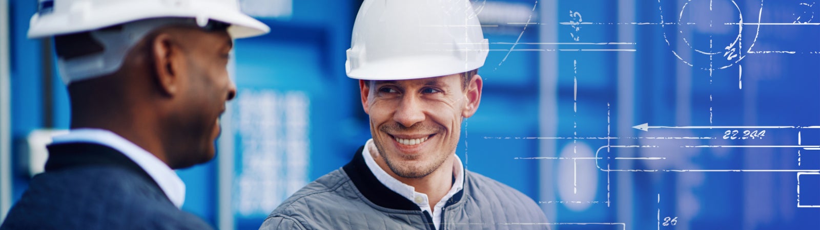 Photo of two port workers shaking hands, with a blueprint superimposed onto the image.