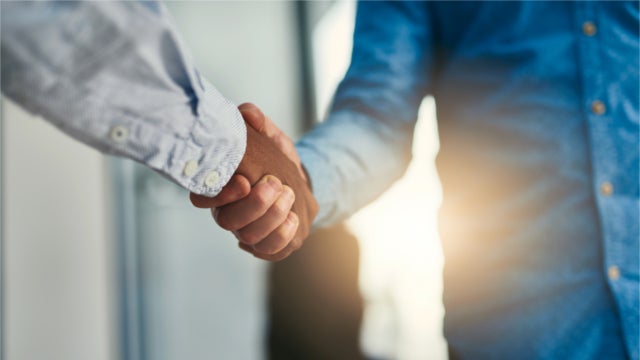 Two people shaking hands