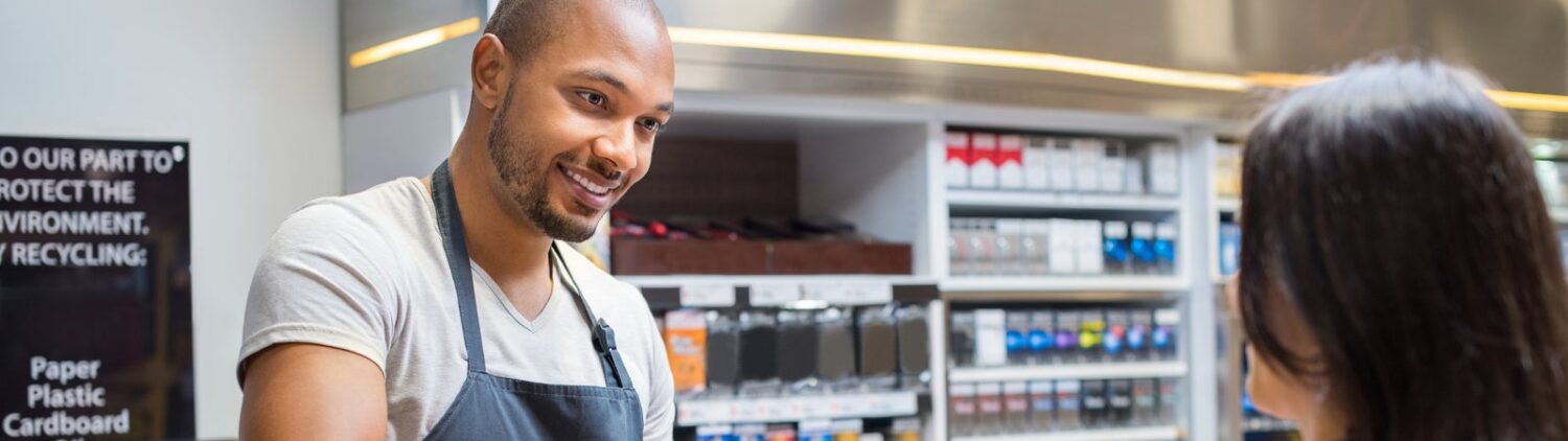 Cashier working at supermarket