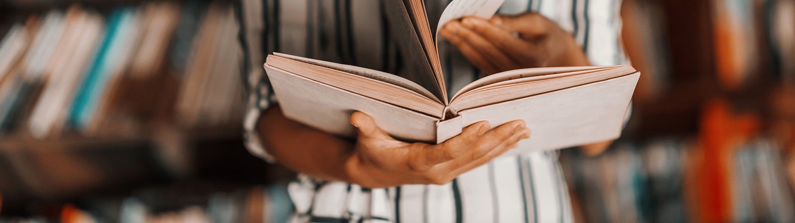 Girl reads library book