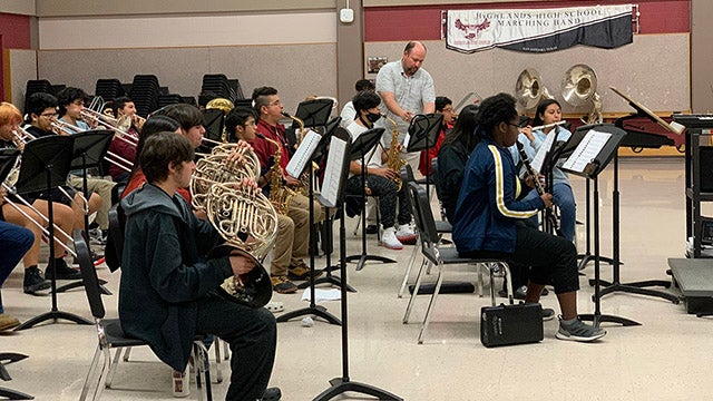 Band teacher with school band