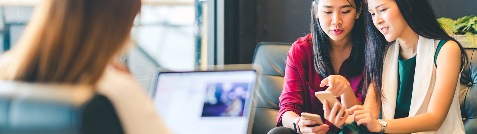 Girls using smartphones