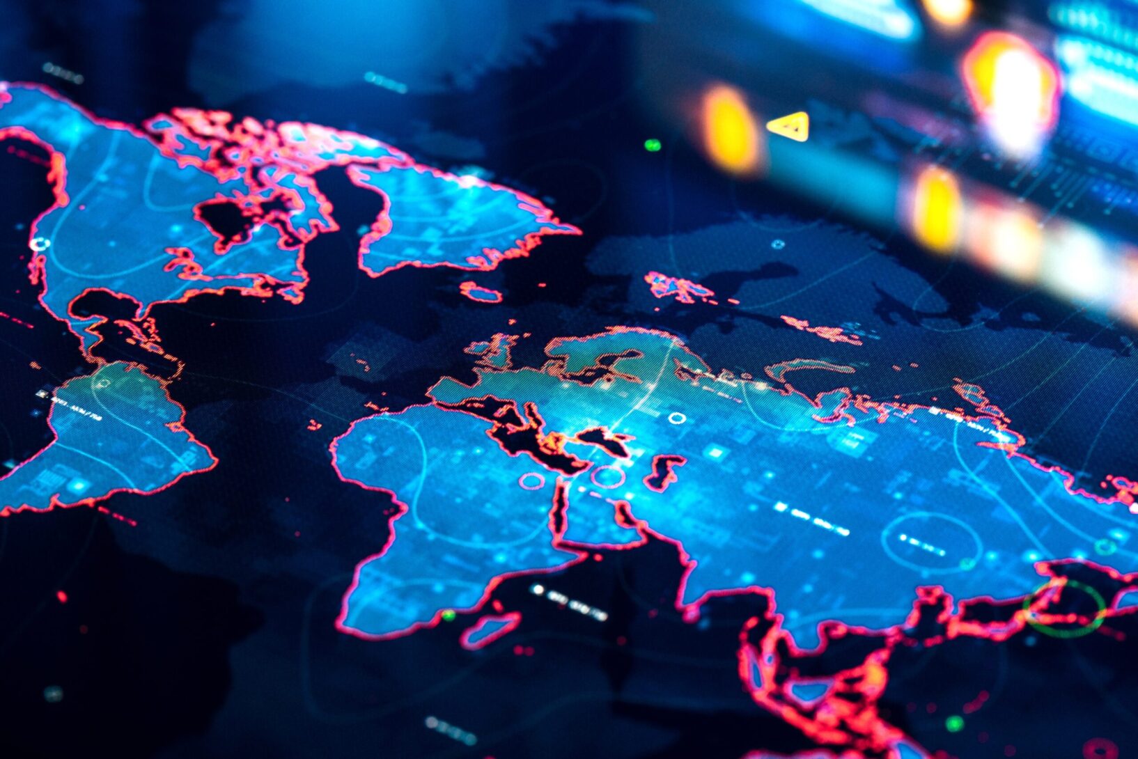 A photograph of a world map on a digital display, representing AI geopolitics and the role of the Global South.