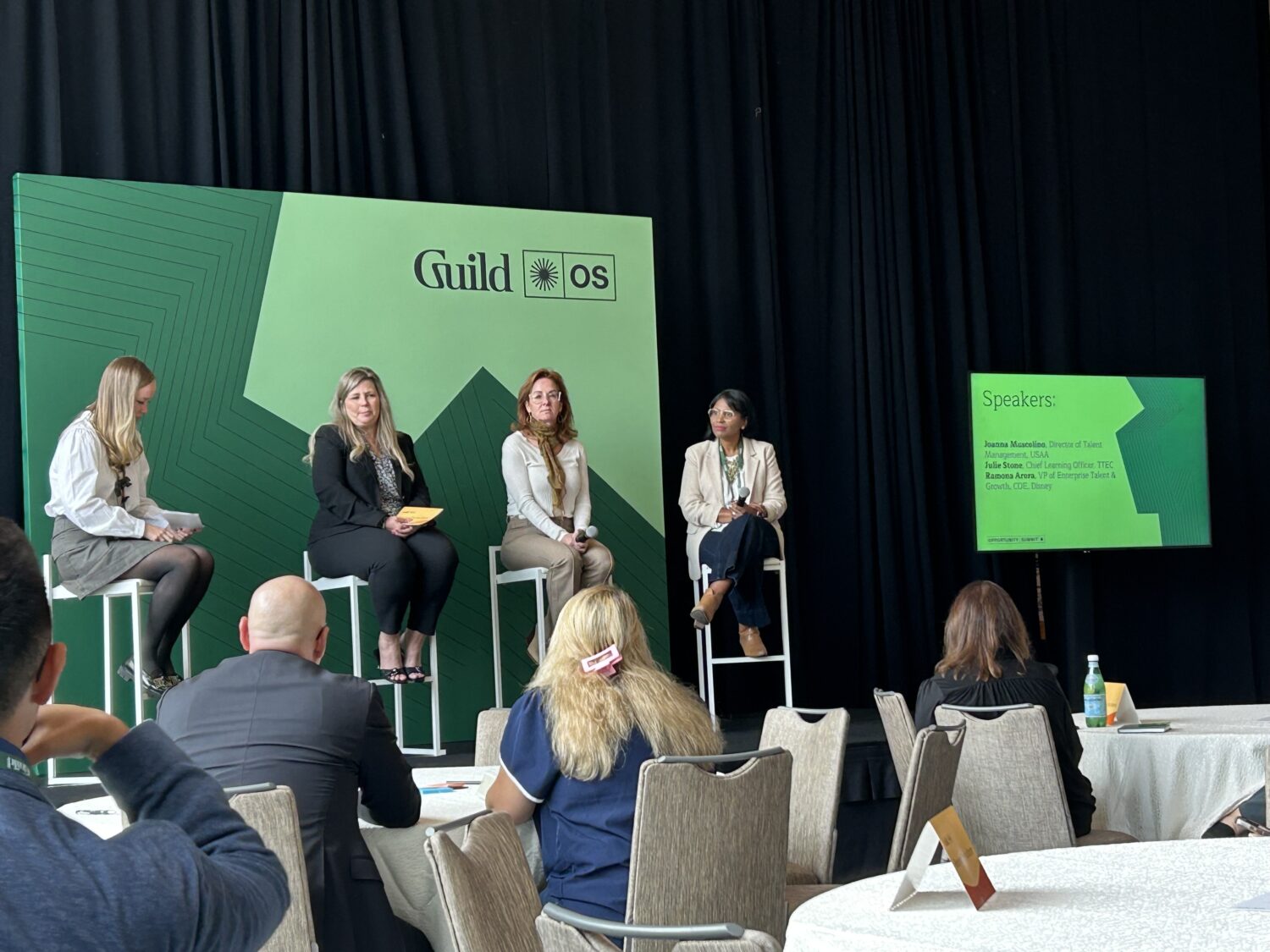 Joanna Muscolino on stage with fellow speakers at the 2025 Guild Opportunity Summit.