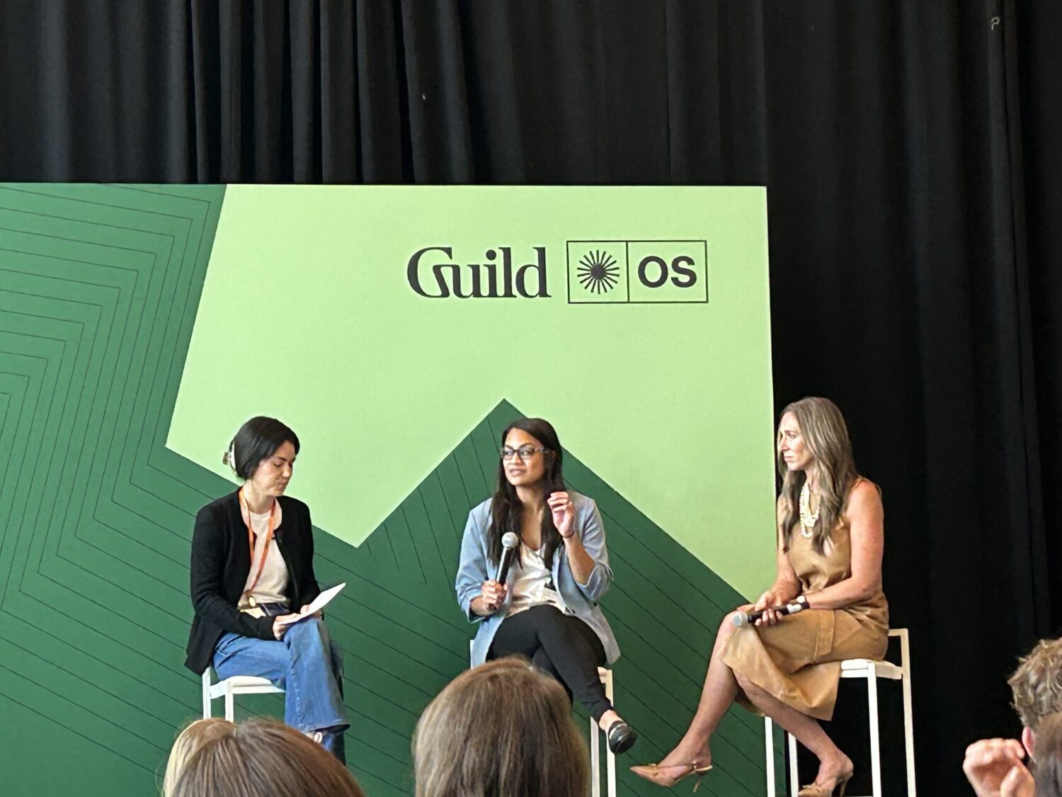 Lauren Allen on stage with fellow speakers at the 2025 Guild Opportunity Summit.