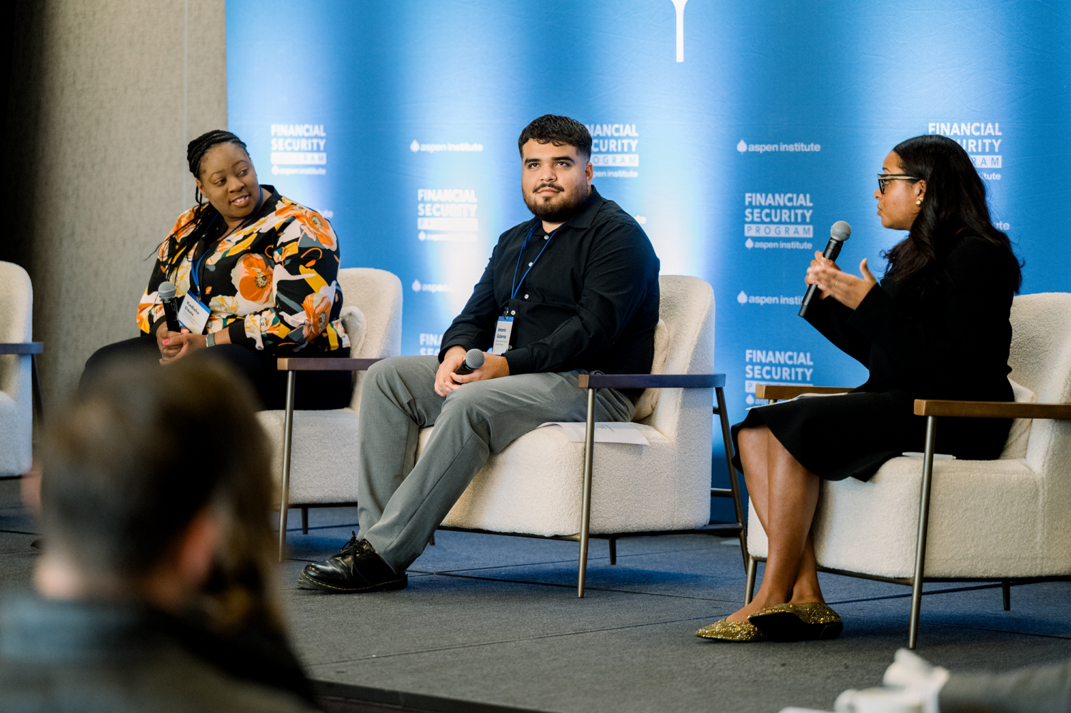 Three speakers participate in a panel at the 2025 Aspen Benefits Leadership Forum.