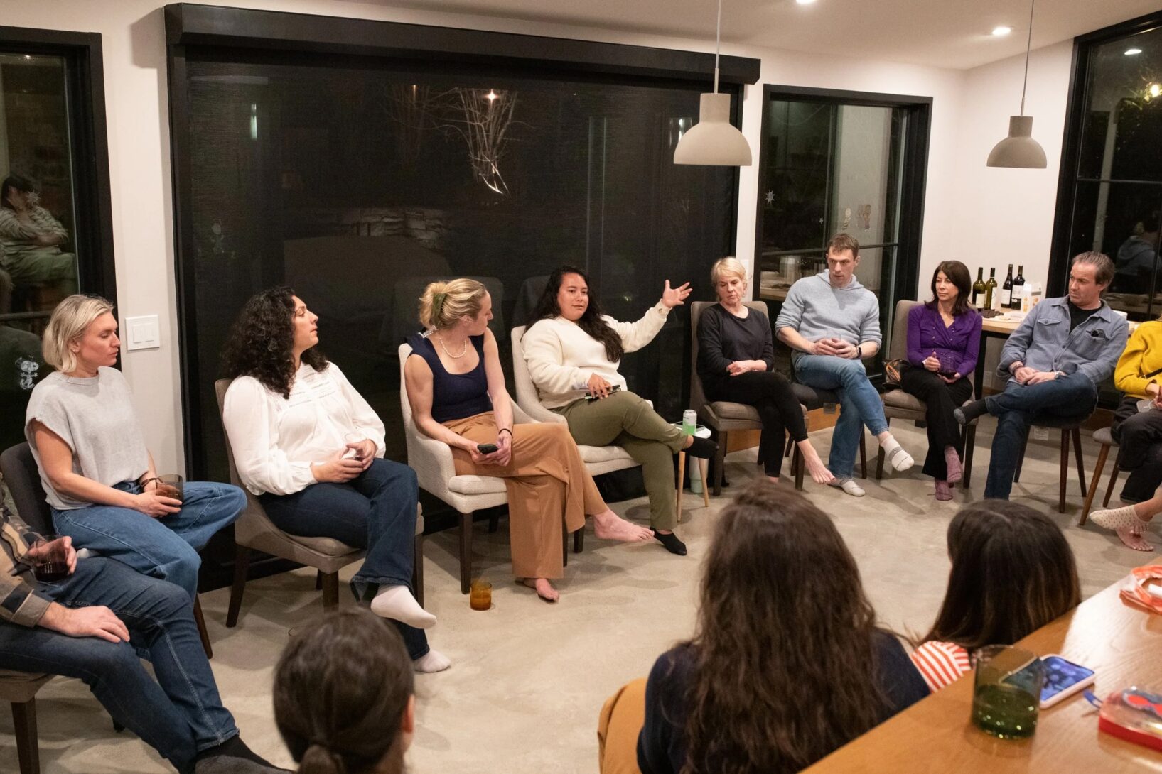 Neighbors in Montclair, NJ, gather in a living room to discuss a topic and build relationships with each other. Photo credit: Jennifer Liseo