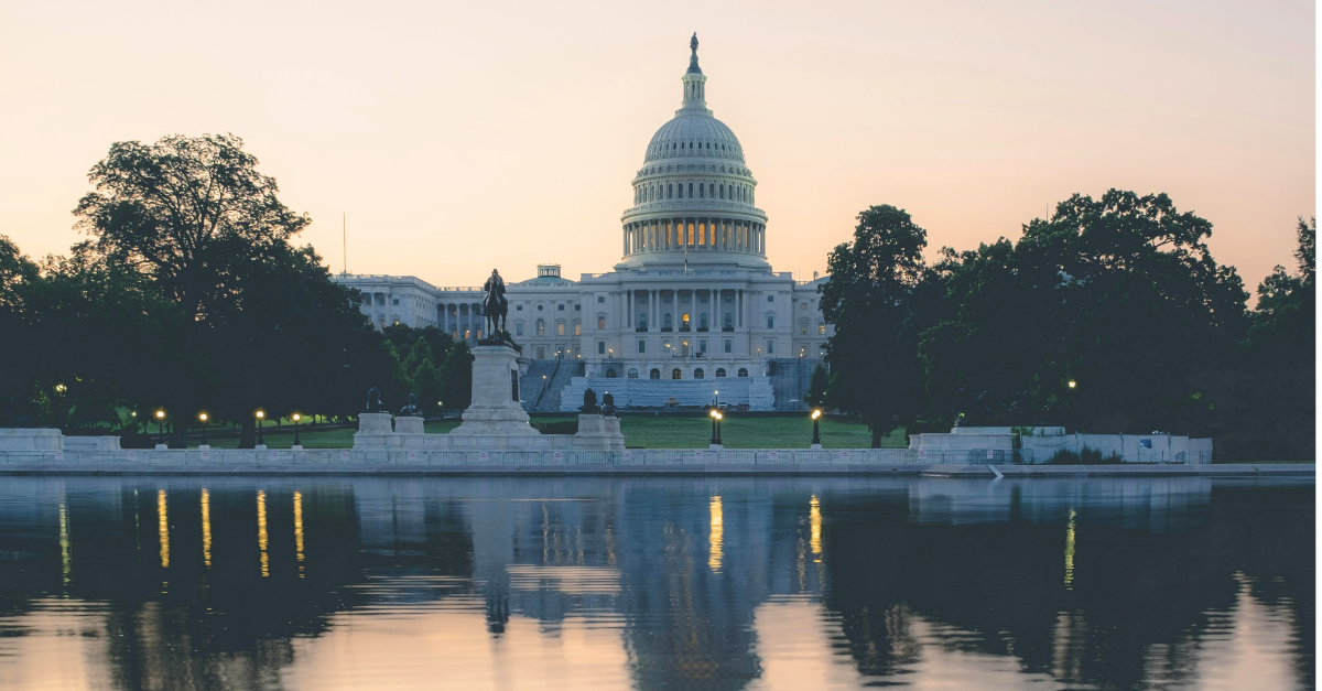 An orange sunset over the capitol building in Washington, D.C.