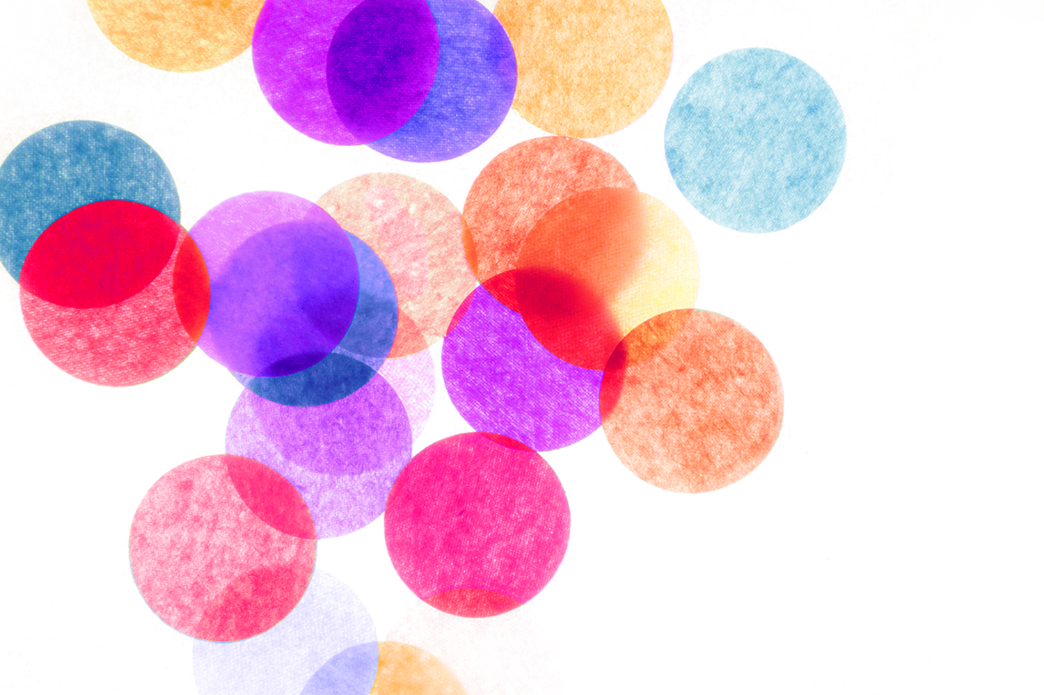 collage of overlapping translucent paper circles, like many overlapping Venn diagrams
