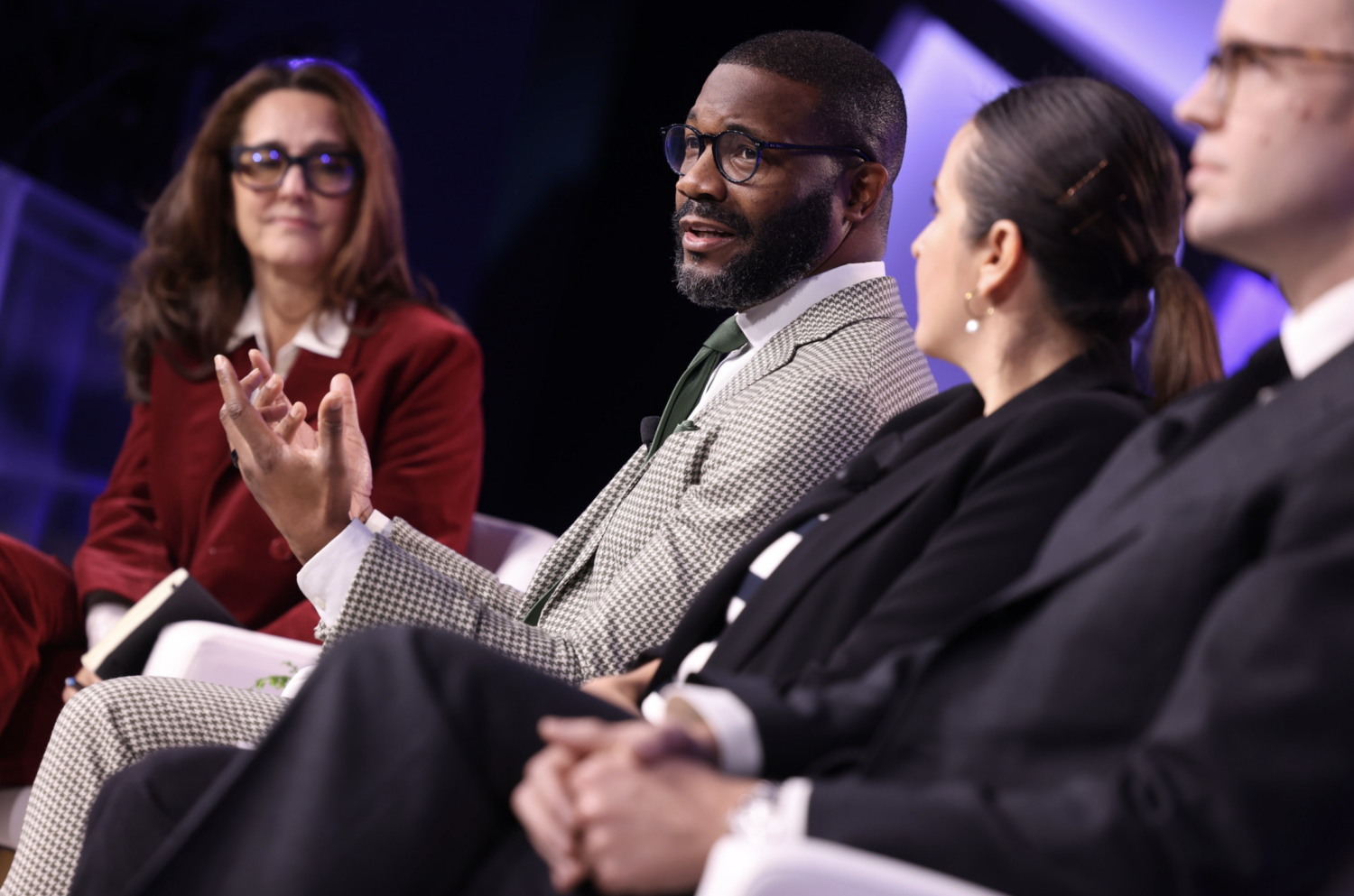 Mayor Woodfin (center) speaking at Bloomberg CityLab 2023