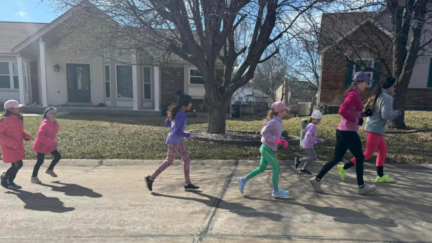Neighborhood kids enjoying a run club they started together. Photo credit: Jennifer Prophete